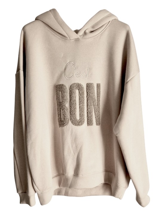 Sweat capuche beige, épais, cocoon, motif "C'EST BON" en bouclette taupe.