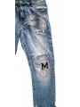 Jean boyfriend bleu denim used de chez Sexy Woman sublimé par ses patchs en strass LOVE, N°5