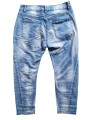 Jean baggy stone washed de chez Sexy Woman, effet d'usures travaillées, patchs cœurs en sequins léopard.