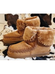 Boots fausse fourrure camel ultra tendance incontournables des "Fashion Addicts"